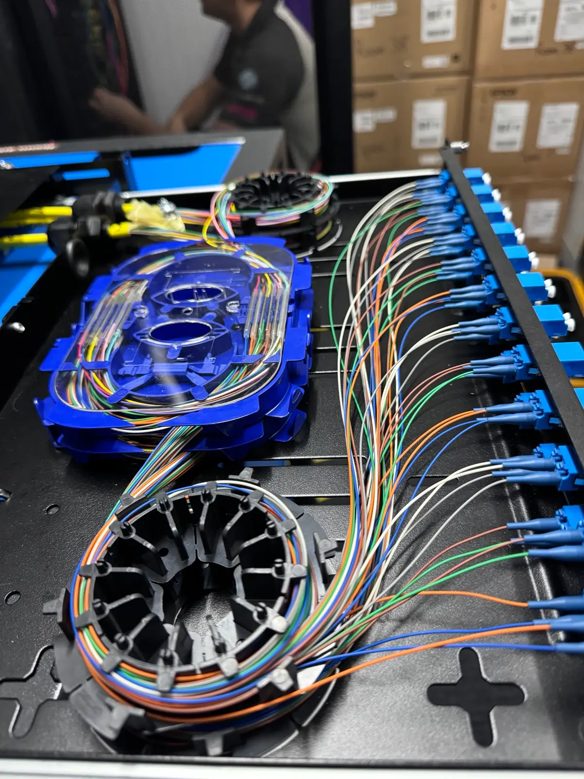 Fibre enclosure assembly on the workshop bench.